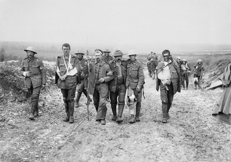 British and German wounded, Bernafay Wood, 19 July 1916. Photo by Ernest Brooks.