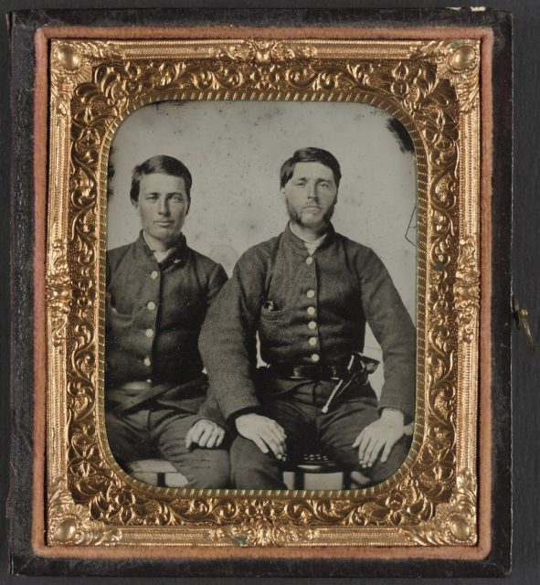 Brothers Private Stephen D. and Private Moses M. Boynton of Co. C, Beaufort District Troop, Hampton Legion South Carolina Cavalry Battalion, with pistol