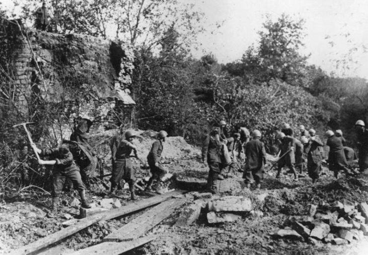 Photo showing the difficulties encountered by the Italians as they advance on Greece. The roads are mostly impassable, but the Italians were able to make some repairs.
