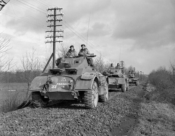 General Motors Staghound T-17E1 armored cars of “A” Squadron, 12th Manitoba Dragoons, in the Hochwald, Germany, 2 March 1945.