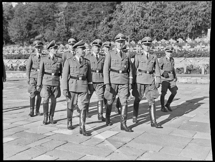 “Gestapo Müller” (front row, to the left) and Reinhard Heydrich visiting a war cemetery in Oslo, Norway in 1941. Photo: NTB/National Archives of Norway CC BY-SA 4.0