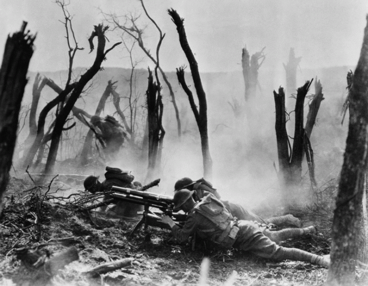 Gun crew from Regimental Headquarters Company, 23rd Infantry, firing 37mm gun during an advance against German entrenched positions, 1918