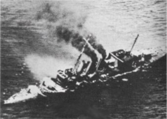 HMS Cornwall, burning and sinking following Japanese dive bomber attacks in the Indian Ocean, 5 April 1942