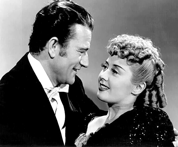 With Joan Blondell in Lady for a Night (1942)