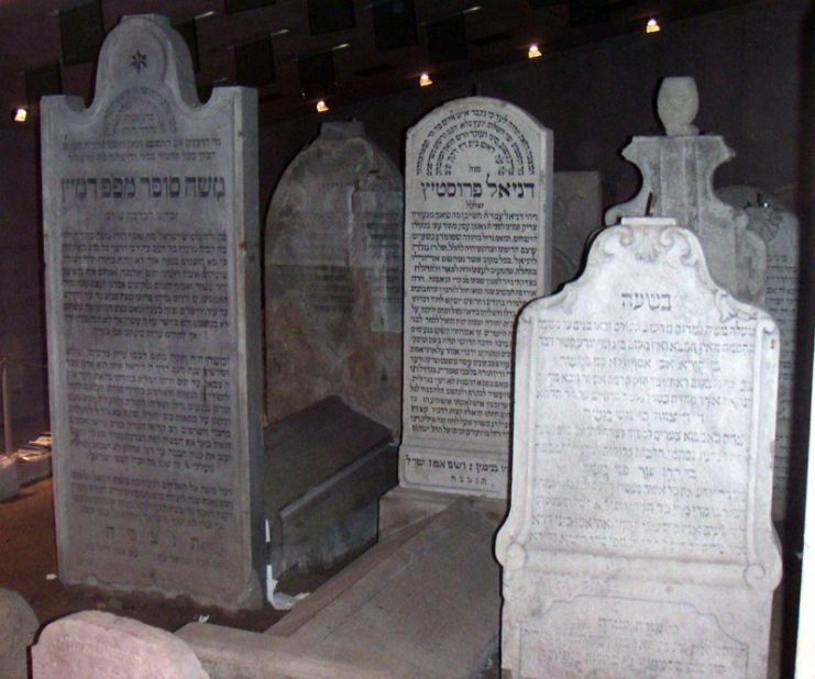 Interior of the Jewish memorial in Bratislava, Slovakia (with the grave of the rabbi Chatam Sofer at the left). The Jewish cemetery in Bratislava was desecrated during the Holocaust.Photo by Smerus CC BY SA 3.0