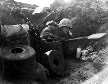 United States Marines launch a counterattack to regain enemy-held positions at Outpost Vegas on Korea’s Western Front on 27 March 1953. It was the bloodiest action Marines on the Western Front had engaged in up to that date.