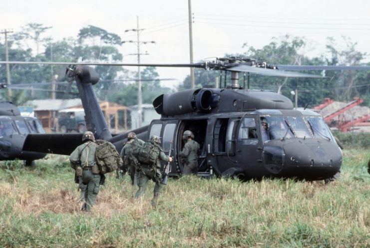 Soldiers board a 101st Airborne Division UH-60 Black Hawk (Blackhawk) helicopter for an airborne assault