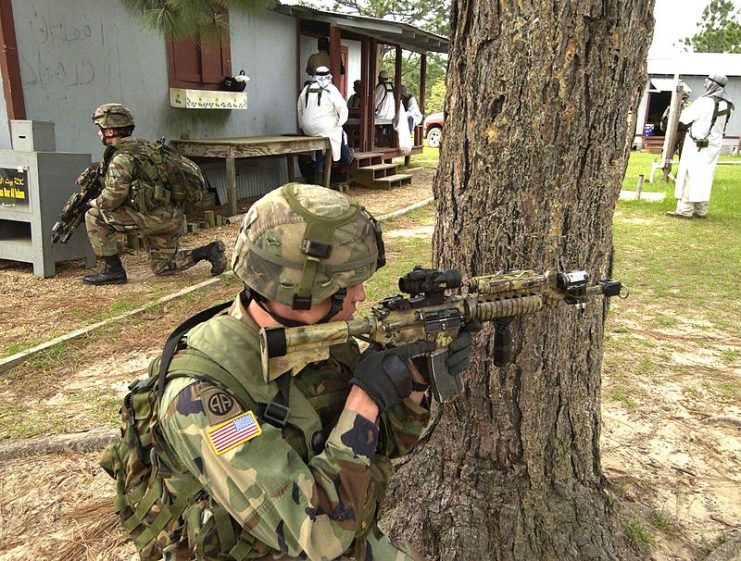 Soldiers from the 82nd Airborne Division participate in an exercise in a simulated Iraqi village at the Joint Readiness Training Center.