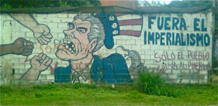 Street art in Caracas, depicting Uncle Sam and accusing the American government of imperialism.Photo: Erik Cleves Kristensen CC BY 2.0
