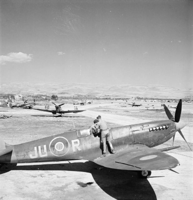 Supermarine Spitfires of No. 111 Squadron undergoing maintenance at Comiso, Sicily.