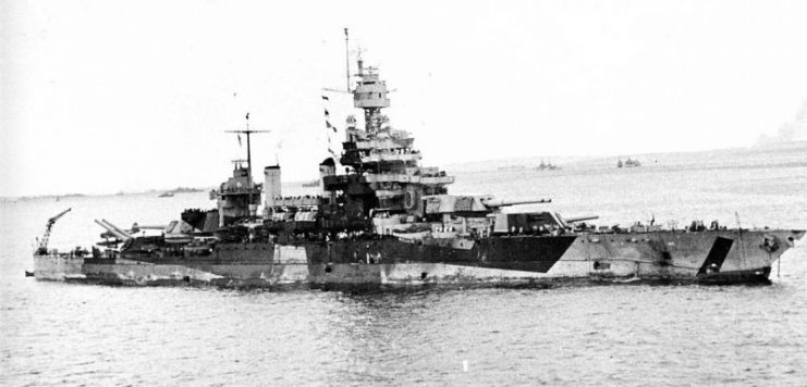 USS Colorado off Tinian, on 24 July 1944, with hull damage, the result of 22 hits from shore batteries