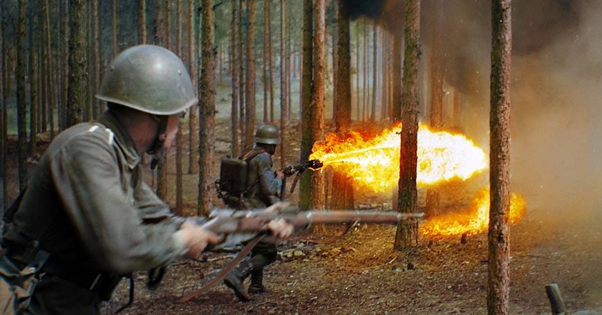 Flamethrower in action, during an officer trainees training session, in the woods near the village of Niinisalo, Finland - July 1, 1942. Colorized by Jecinci.