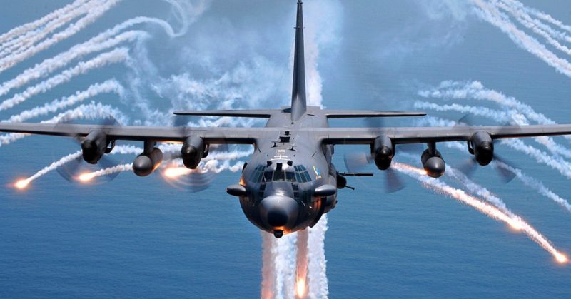 An AC-130H gunship from the 16th Special Operations Squadron, Hurlburt Field, Florida, jettisons flares as an infrared countermeasure during multi-gunship formation egress training on August 24, 2007.