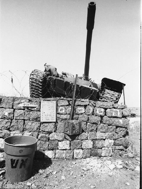 A destroyed Syrian T-55 tank at Nafakh on the Golan Heights. Photo by Israel Defense Forces -CC BY-SA 2.0