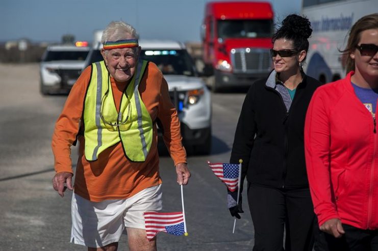 STERLING CITY, Texas — Ernie Andrus, Navy World War II veteran, runs through Sterling City with locals March 26. Andrus is running coast to coast in hopes to raise enough money to return the USS LST-325, a tank landing ship, to Normandy for the 2019 D-Day memorial service. (U.S. Air force photo/ Airman 1st Class Devin Boyer)