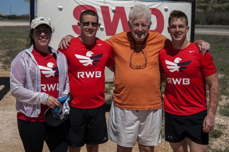 STERLING CITY, Texas — Ernie Andrus, Navy World War II veteran, poses for a photo with Team Red White and Blue members March 26. Team RWB accompanied Andrus in his 7.11 mile run through Sterling City. (U.S. Air force photo/ Airman 1st Class Devin Boyer)