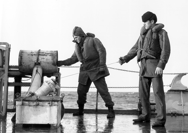 Coast Guardsman preparing K Gun