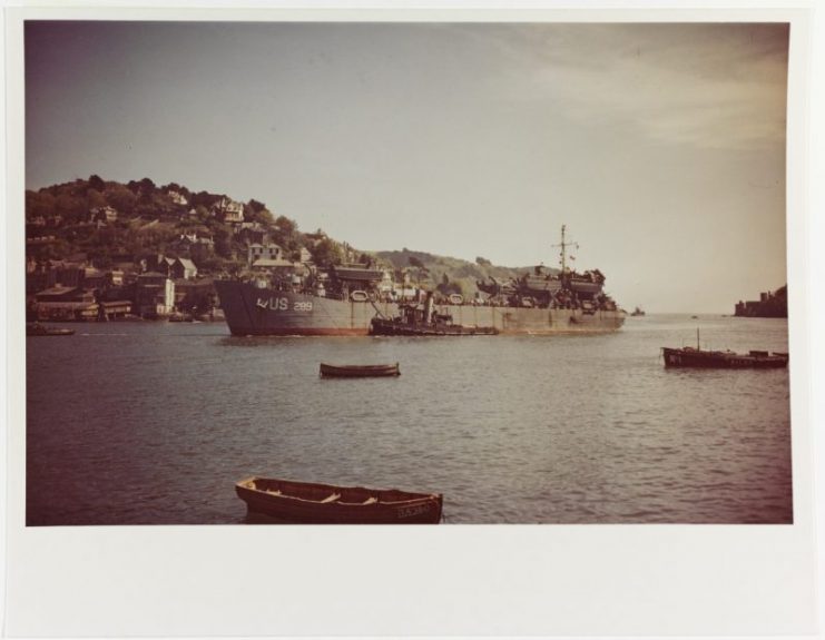 USS LST-289 arrives in Dartmouth Harbor, England, after being torpedoed by German MTBs during an invasion rehearsal off Slapton Sands