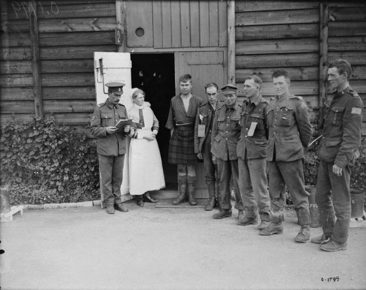 Canadians wounded on Hill 70 being checked before the train leaves a Casualty Clearing Station. August, 1917.