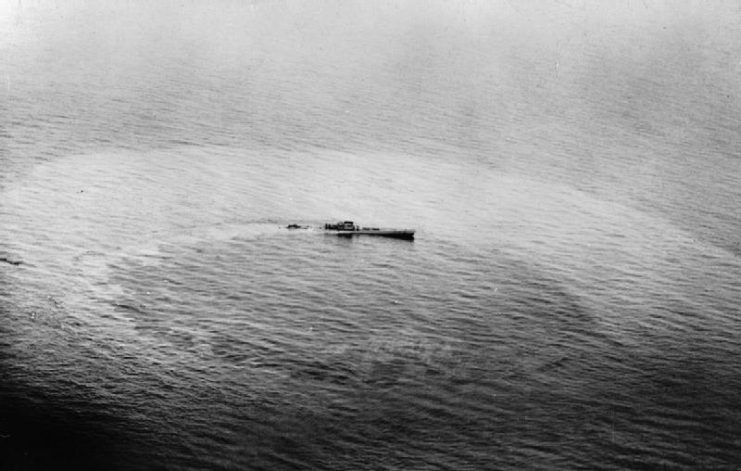 U-459, a Type XIV supply submarine (known as a “milch cow”) sinking after being attacked by a Vickers Wellington