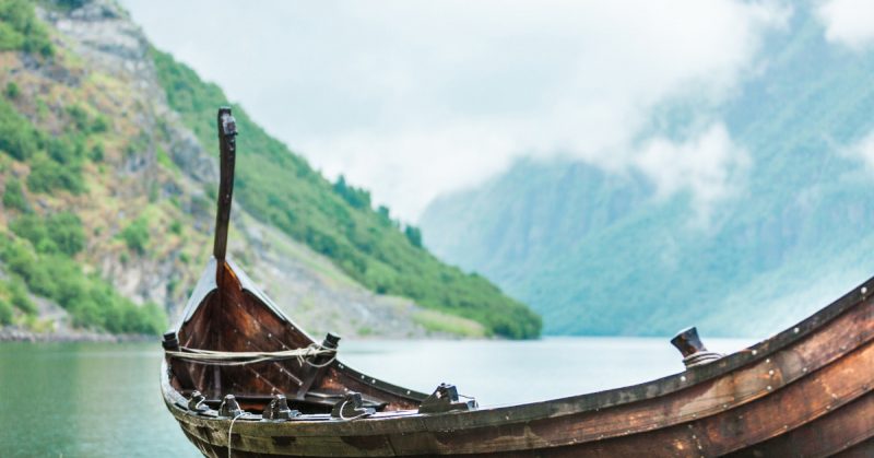 Old wooden viking boat in Norwegian nature