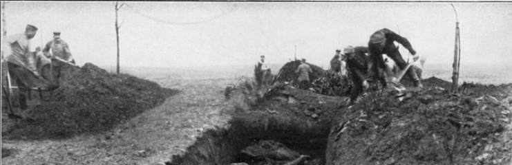 Common grave near Fromelles (or Vimy ) 1916 (or 1917). Fallen German and British soldiers in a common grave.