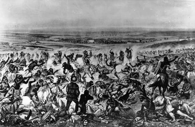 “Custer’s Last Stand.” Lieutenant Colonel Custer standing center, wearing buckskin, with few of his soldiers of the 7th Cavalry still standing.