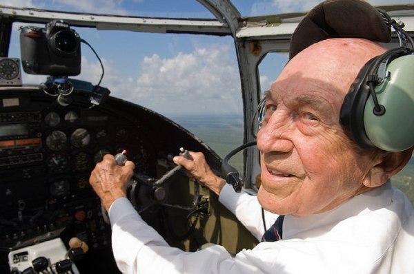 Retired Air Force Lt. Col. Richard E. “Dick” Cole, co-pilot to Jimmy Doolittle during the April 18, 1942, Doolittle Raid over Tokyo, sits at the controls of a refurbished U.S. Navy B-25 Mitchell displayed at an airshow in Burnet, Texas, in September. (Staff Sgt. Vernon Young Jr./Air Force)