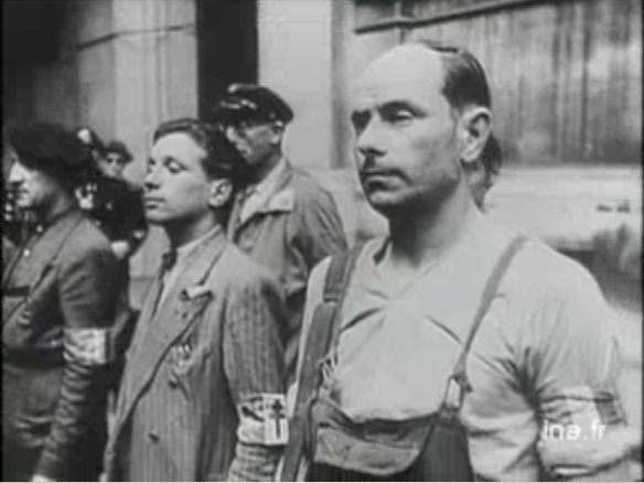 French resistance fighters in Paris at the Hotel de Ville, 1944.