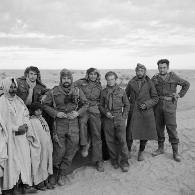 Members of the ‘French Squadron SAS’ (1ere Compagnie de Chasseurs Parachutistes) during the link-up between advanced units of the 1st and 8th armies in the Gabes-Tozeur area of Tunisia.