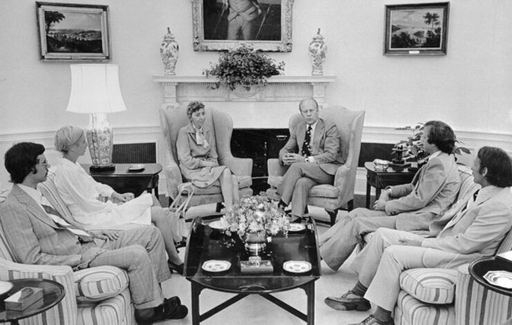 Gerald Ford sitting in a room with members of Frank Olson's family