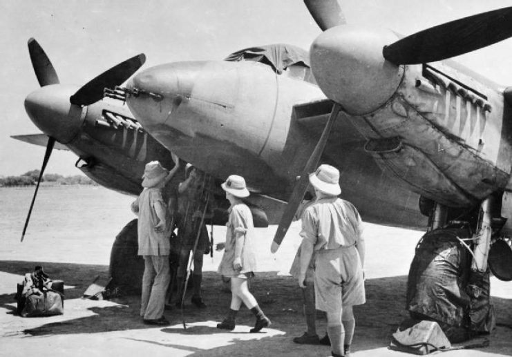 Airmen inspect Mosquito Mark II, DZ695, on an airfield in India following delivery by No. 1 Overseas Aircraft Despatch Unit.