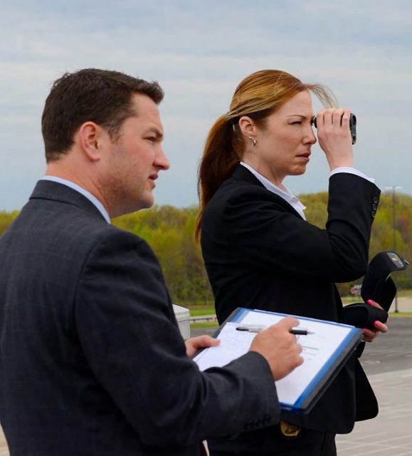 Secret Service agents conducting counter surveillance advance