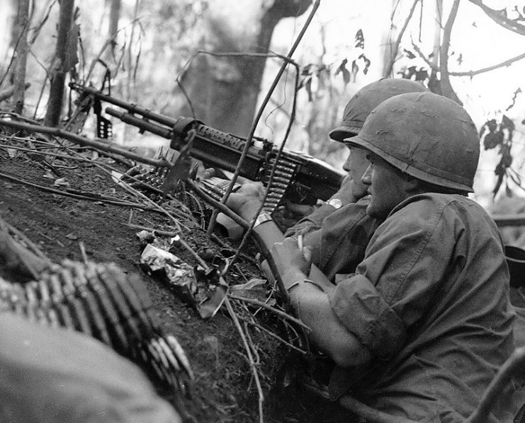 Soldiers Laying Down Covering Fire with a M60 machine-gun – Vietnam