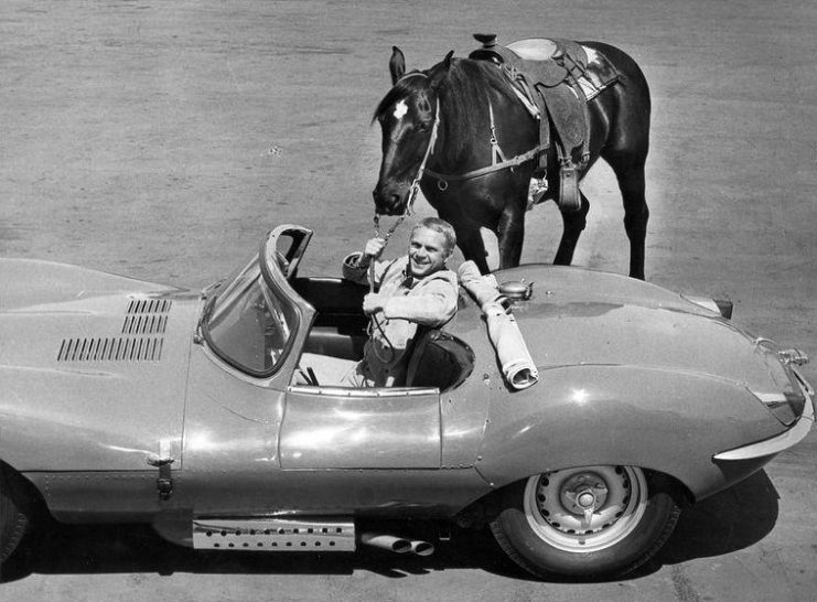 McQueen with two forms of transportation – his horse, Doc, and his Jaguar XKSS (1960)
