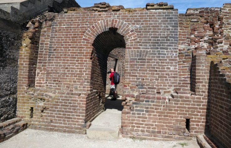 The six-foot thick magazine wall slopes back to the left the repaired Tabby wall at Fort Sumter, Charleston, South Carolina, USA.