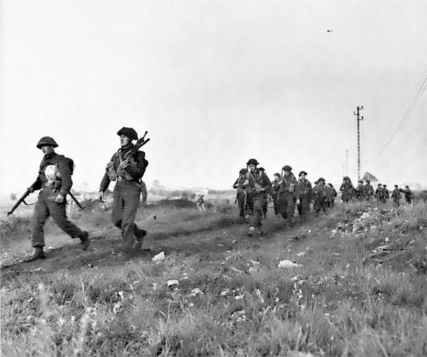 The Royal Winnipeg Rifles advance inland on D-Day.