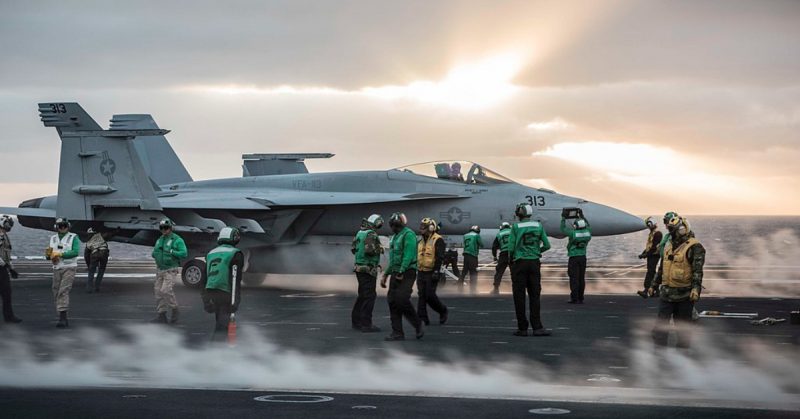 A U.S. Navy F/A-18E Super Hornet assigned to Strike Fighter Attack Squadron (VFA) 113 prepares to take off from the aircraft carrier USS Theodore Roosevelt (CVN 71) in the Pacific Ocean, Oct. 10, 2017.