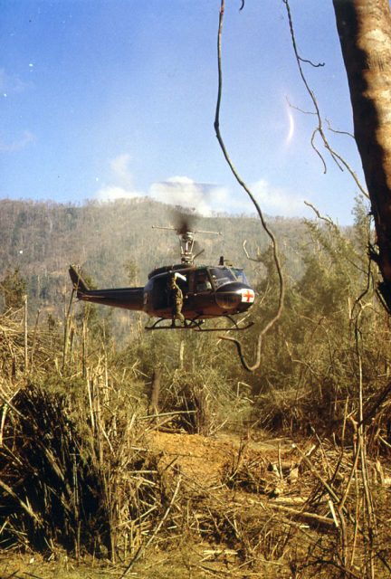 South Vietnam. A UH-1D Medevac helicopter takes off to pick up an injured member of the 101st Airborne Division, near the demilitarized zone.Date 16 October 1969