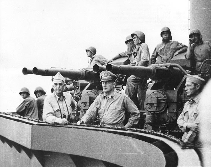 Allied Naval Forces SWPA, commander Vice Admiral Thomas C. Kinkaid (centre left) with MacArthur (centre) on 28 February 1944 on USS Phoenix during the bombardment of Los Negros Island, at the commencement of the Admiralty Islands campaign.