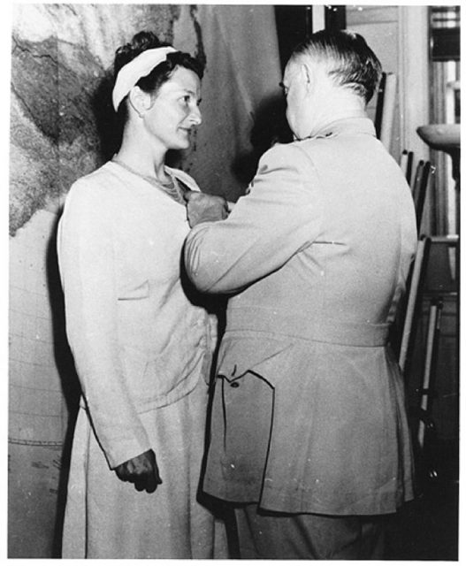 Virginia Hall receiving the Distinguished Service Cross in 1945 from OSS chief General Donovan