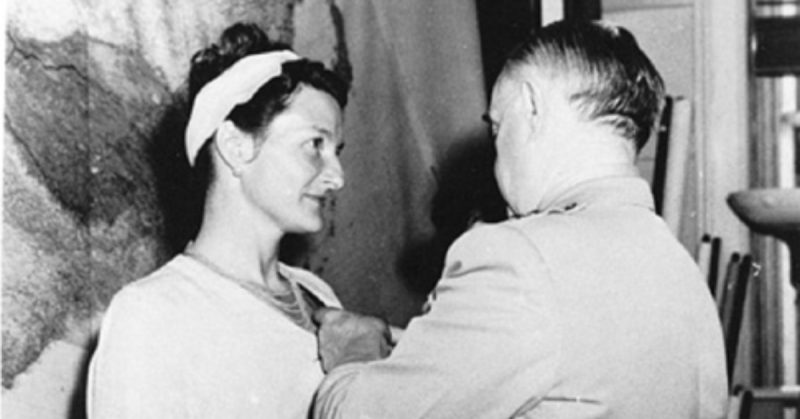 Virginia Hall receiving the Distinguished Service Cross in 1945 from OSS chief General Donovan