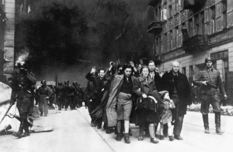 Captured Jews led by the Germans for deportation to death camps.