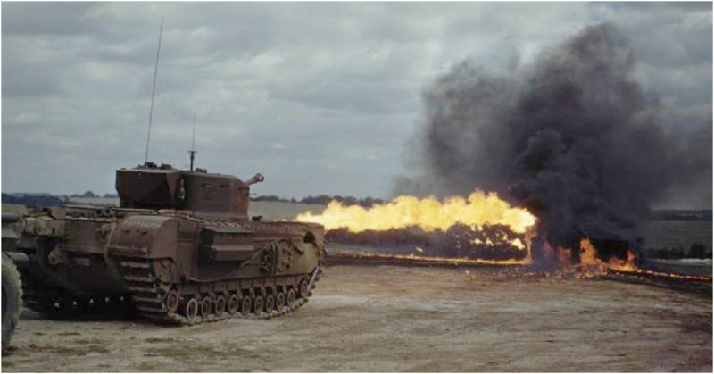  A Churchill tank fitted with a Crocodile flamethrower in action. This flamethrower could produce a jet of flame exceeding 150 yards in length