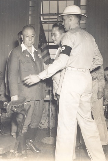 General Tomoyuki Yamashita just after he heard the verdict of death by hanging. He was taken out of the courtroom by military police.