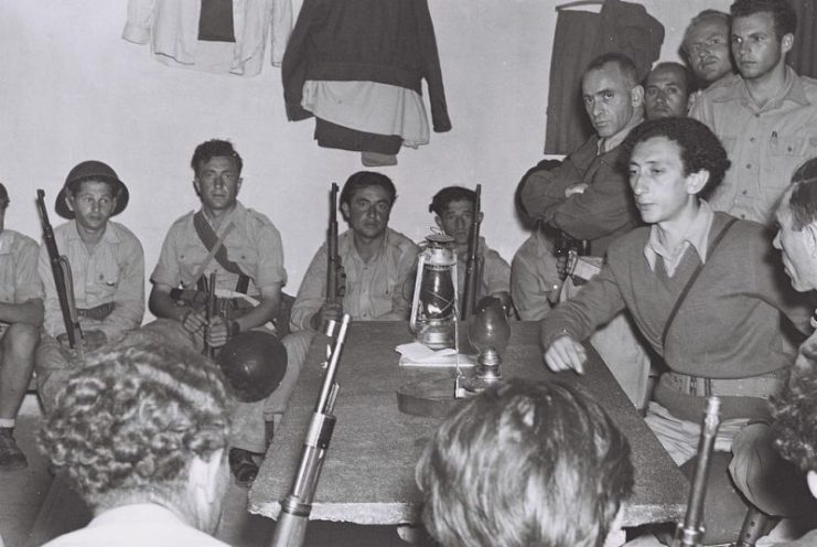 Kovner (right) briefs members of the IDF in Yad Mordechai during the 1947–1949 Palestine war