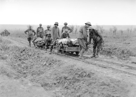Members of the 5th Australian Field Ambulance bringing in wounded during the Australian attack at Broodseinde Ridge