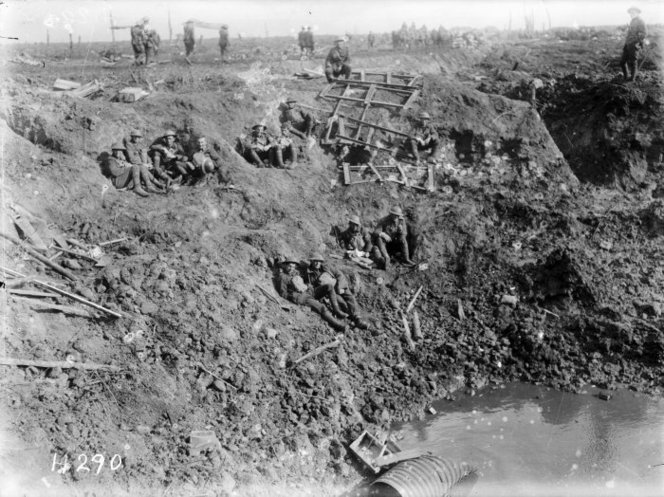 New Zealand Engineers resting in a large shell hole at Spree Farm.