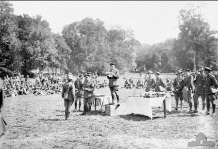 The Australian commander, Monash, presenting decorations to members of the 4th Brigade after the battle