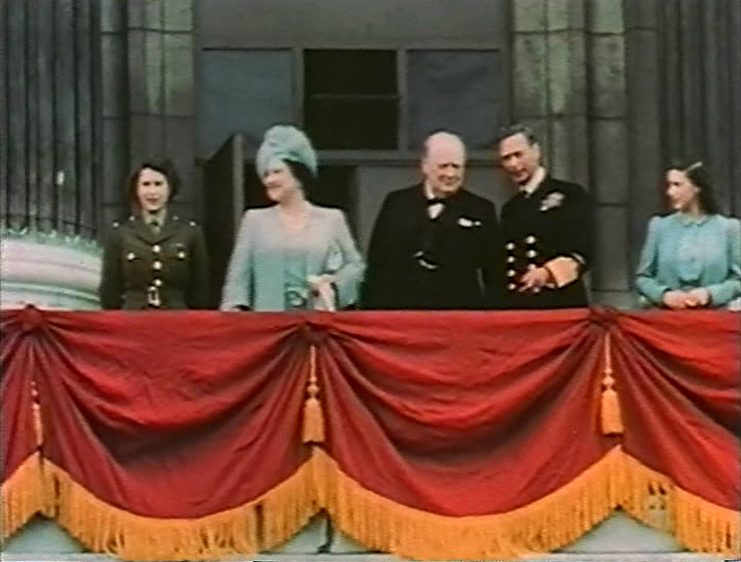 Elizabeth (far left) on the balcony of Buckingham Palace with her family and Winston Churchill on 8 May 1945, Victory in Europe Day